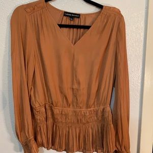 Rust/orange blouse